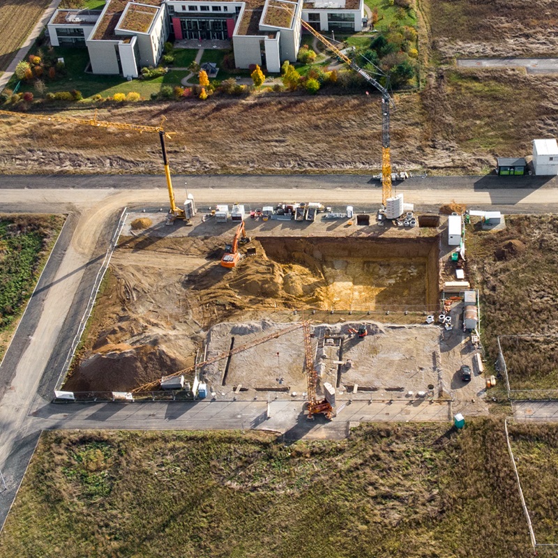 Aerial view of construction site in suburban development